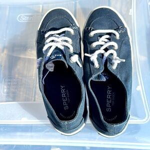 Sperry slip on sneaker. Worn about 5 times.